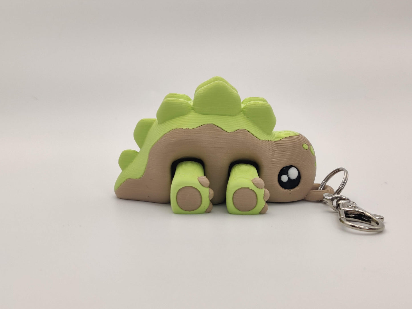 3D Printed Stegosaurus Dinosaur Keychain – Cute Articulated Dino Bag Charm