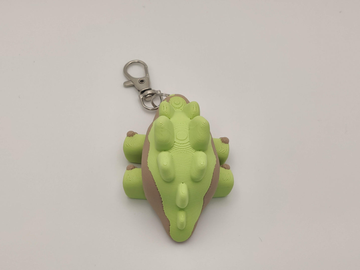 3D Printed Stegosaurus Dinosaur Keychain – Cute Articulated Dino Bag Charm