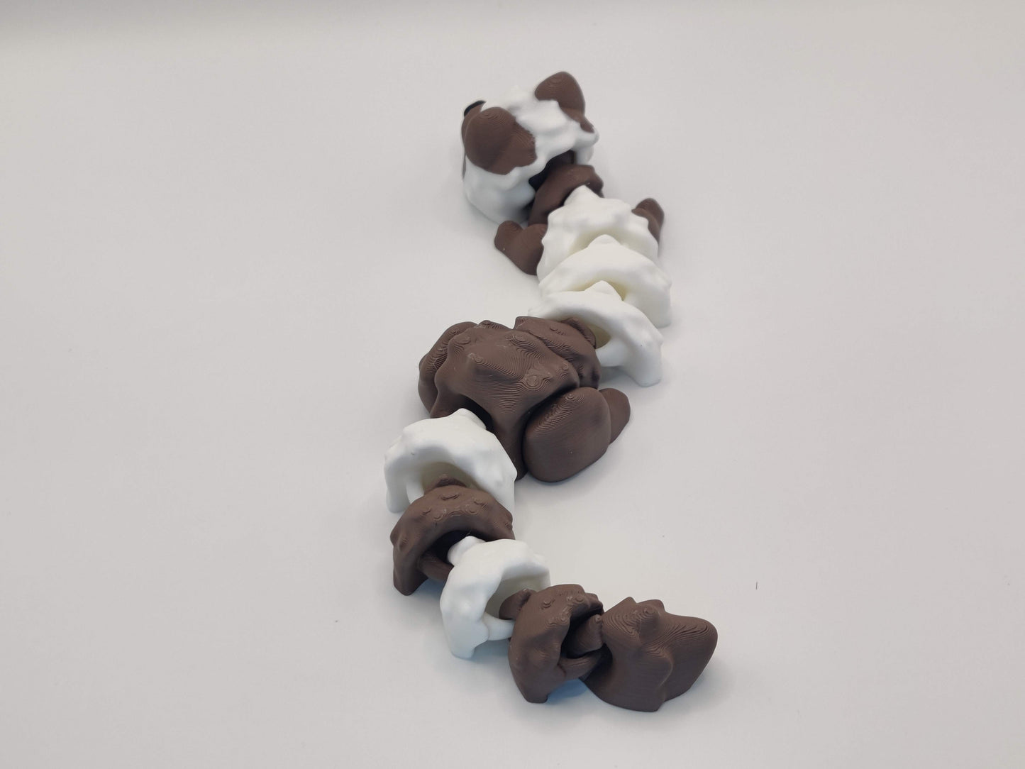 3D Printed Hot Cocoa Ferret Figurine in Brown and White