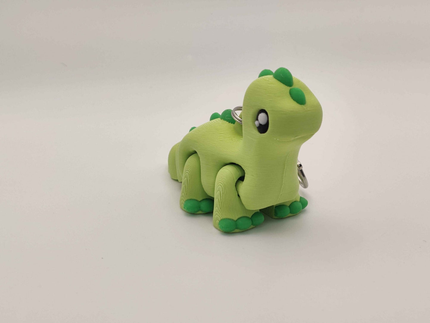 3D Printed Brontosaurus Dinosaur Keychain – Cute Prehistoric Dino Bag Charm - ToyForge 3D