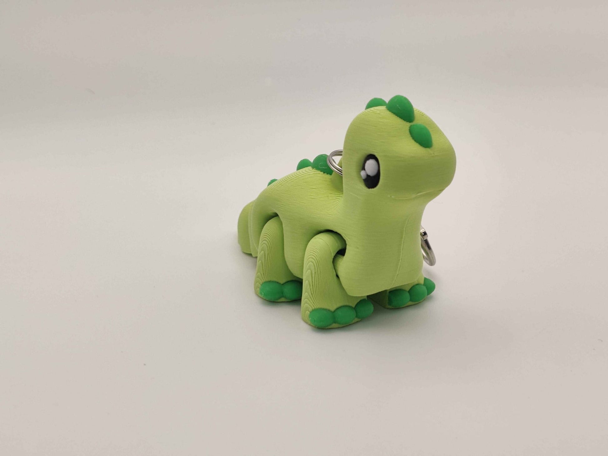 3D Printed Brontosaurus Dinosaur Keychain – Cute Prehistoric Dino Bag Charm - ToyForge 3D