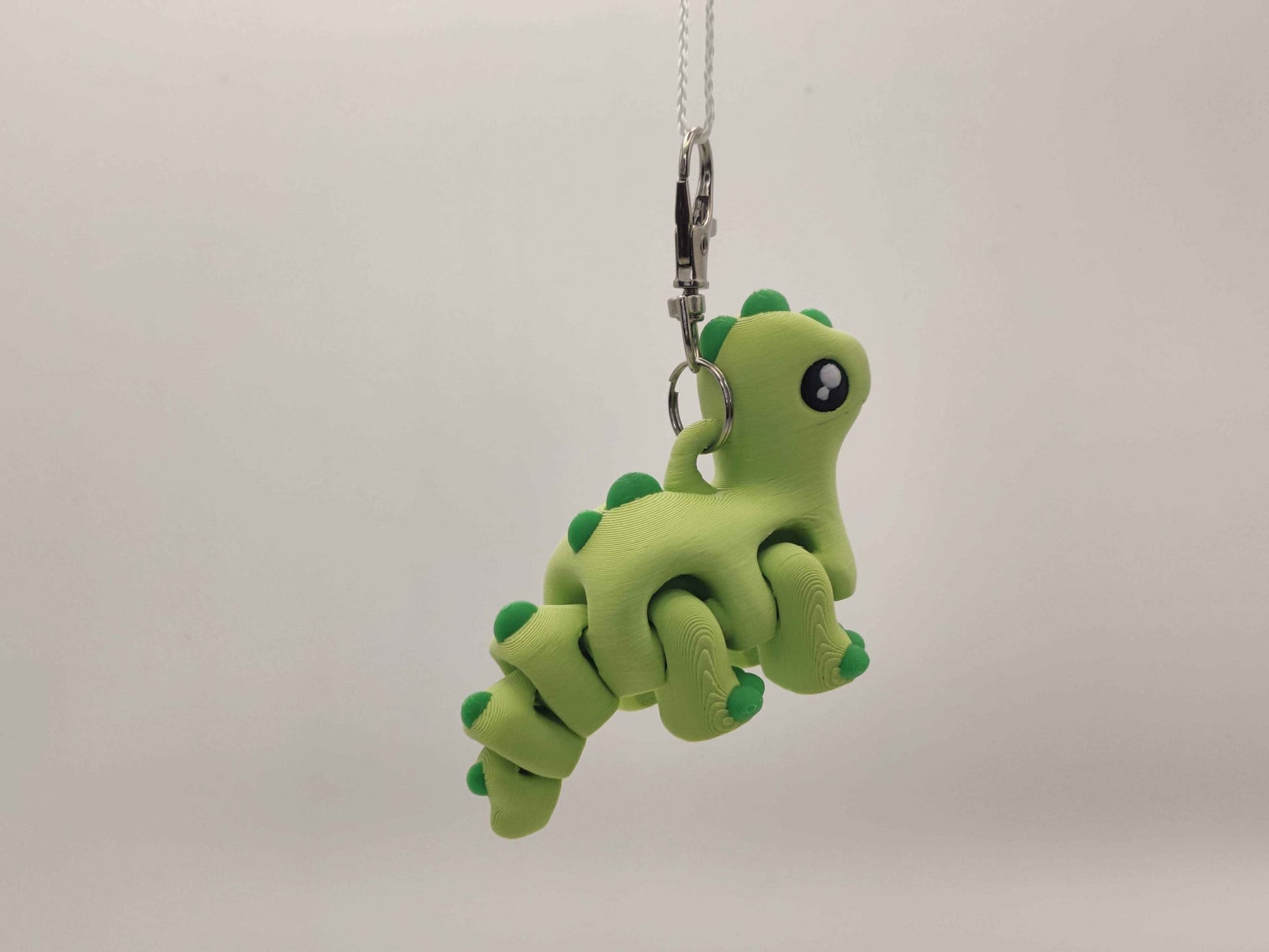 3D Printed Brontosaurus Dinosaur Keychain – Cute Prehistoric Dino Bag Charm - ToyForge 3D