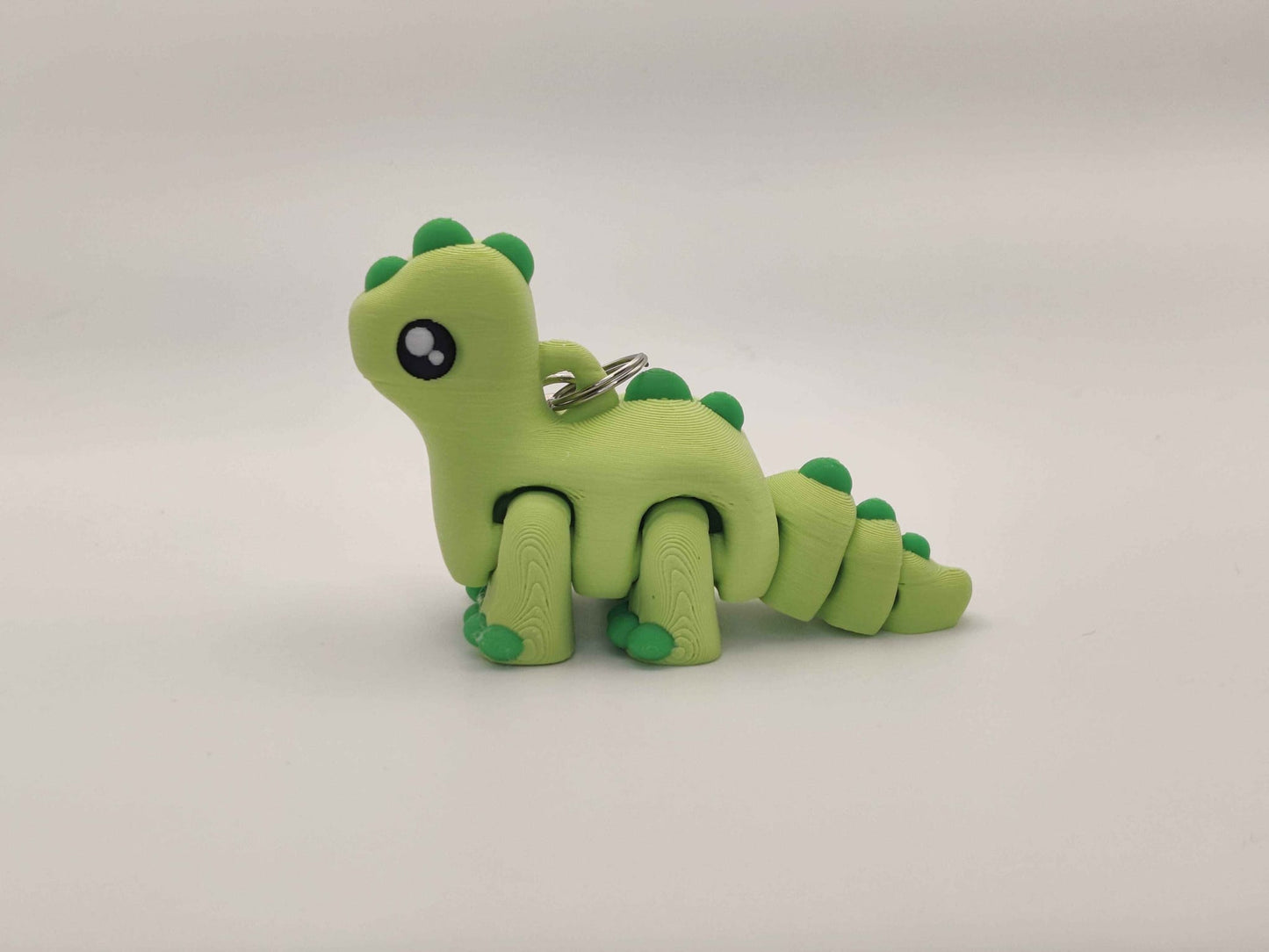 3D Printed Brontosaurus Dinosaur Keychain – Cute Prehistoric Dino Bag Charm - ToyForge 3D