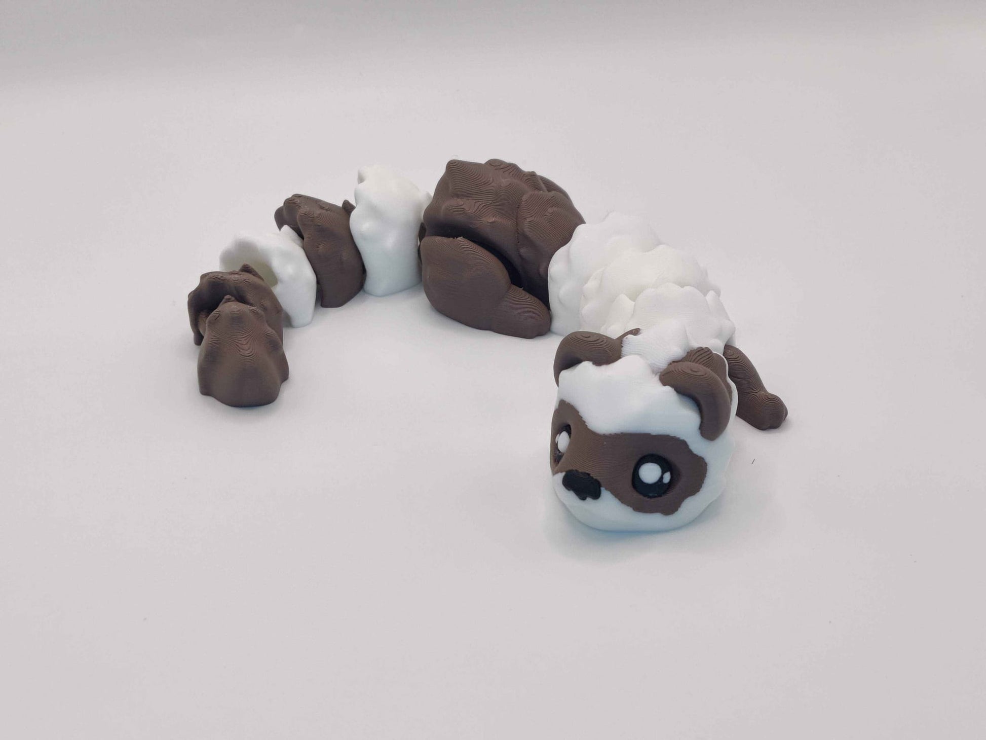 3D Printed Hot Cocoa Ferret Figurine in Brown and White - ToyForge 3D
