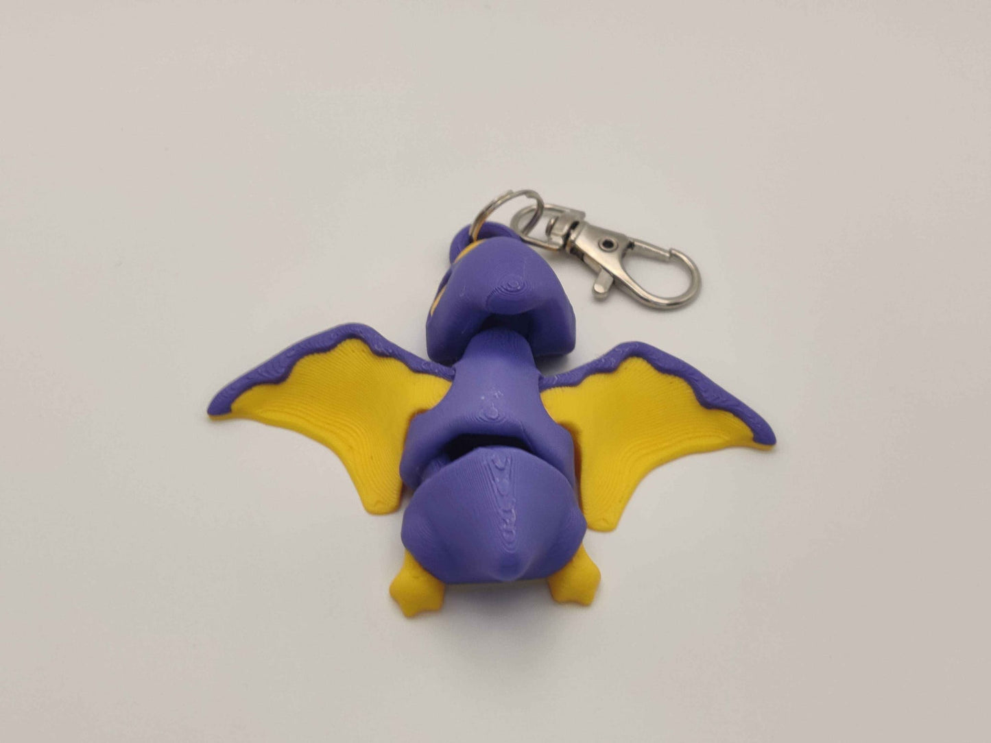 3D Printed Pterodactyl Dinosaur Keychain – Cute Flying Dino Bag Charm - ToyForge 3D