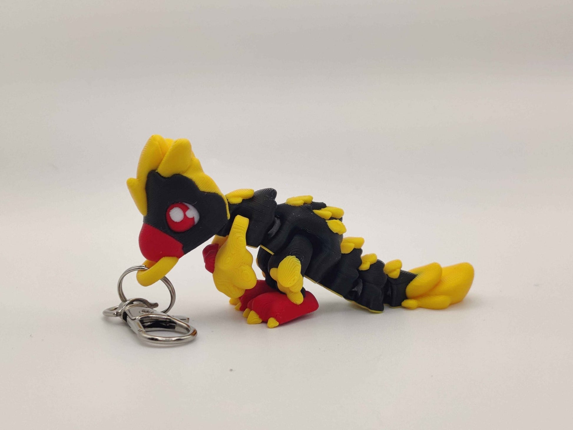 3D Printed Raptor Dinosaur Keychain – Cute Prehistoric Dino Bag Charm - ToyForge 3D
