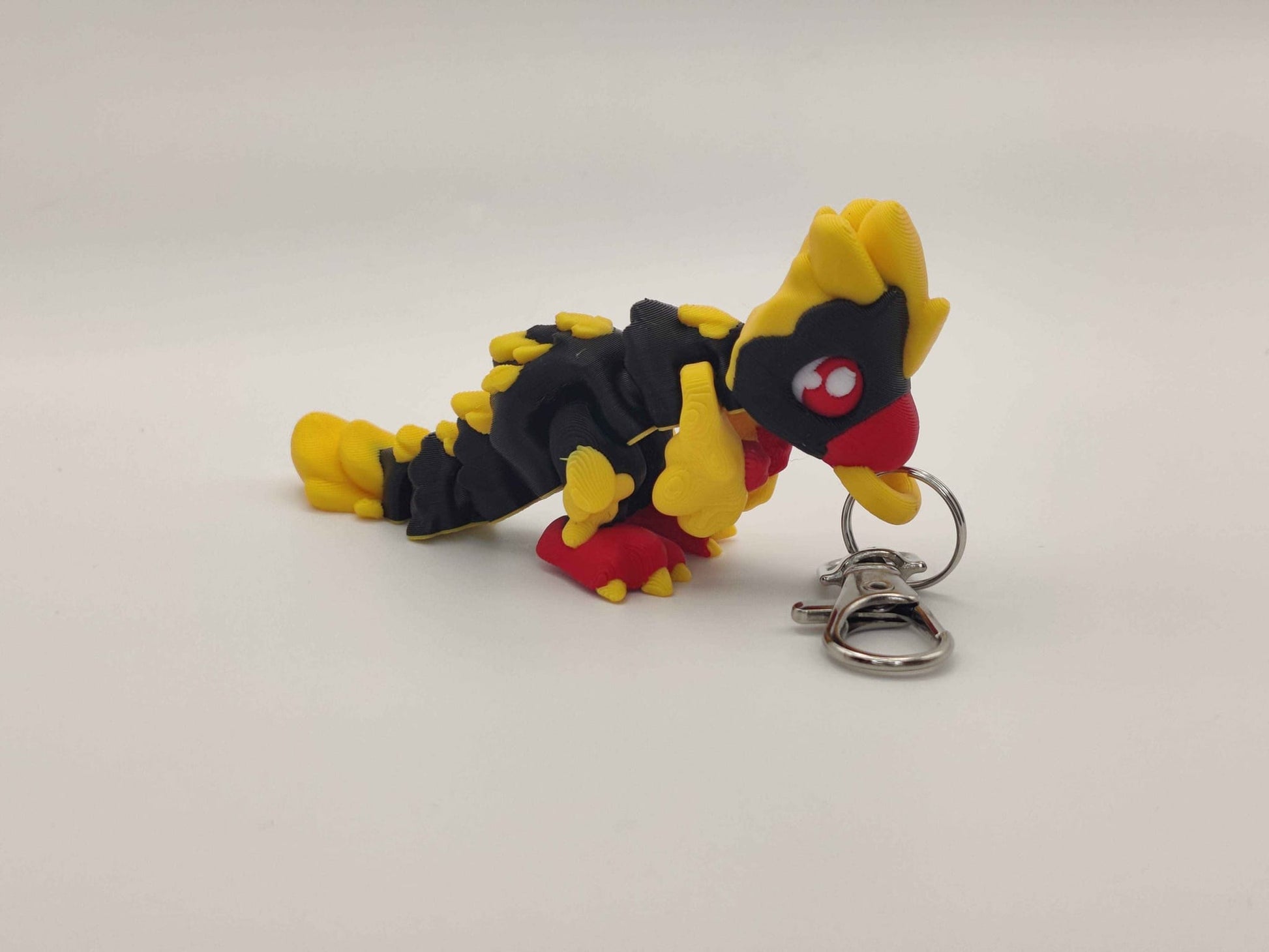 3D Printed Raptor Dinosaur Keychain – Cute Prehistoric Dino Bag Charm - ToyForge 3D