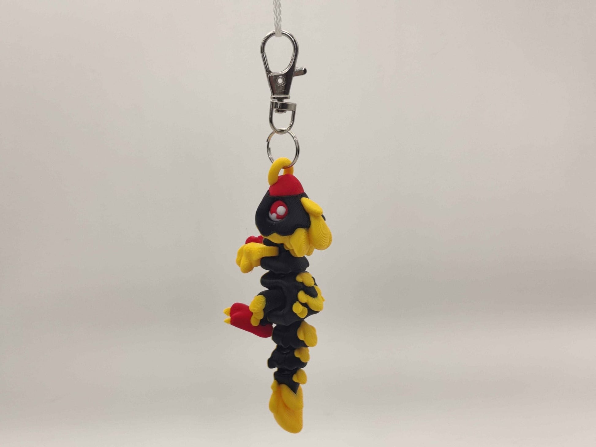 3D Printed Raptor Dinosaur Keychain – Cute Prehistoric Dino Bag Charm - ToyForge 3D