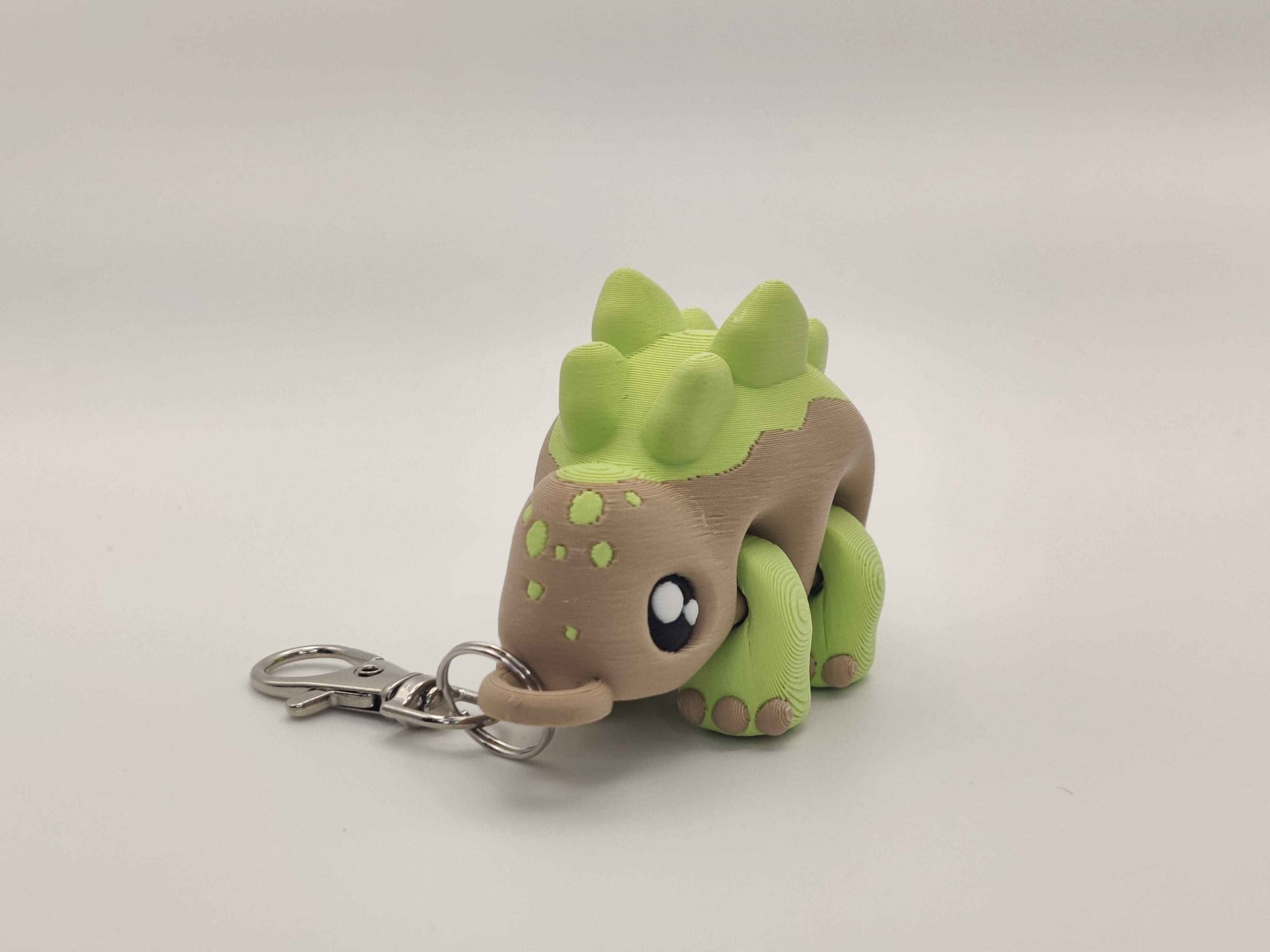 3D Printed Stegosaurus Dinosaur Keychain – Cute Articulated Dino Bag Charm - ToyForge 3D