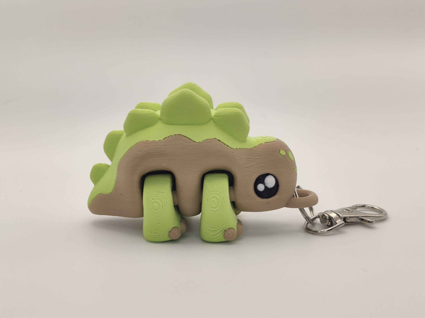 3D Printed Stegosaurus Dinosaur Keychain – Cute Articulated Dino Bag Charm - ToyForge 3D