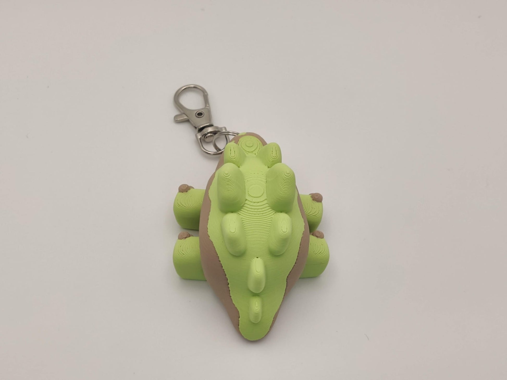 3D Printed Stegosaurus Dinosaur Keychain – Cute Articulated Dino Bag Charm - ToyForge 3D