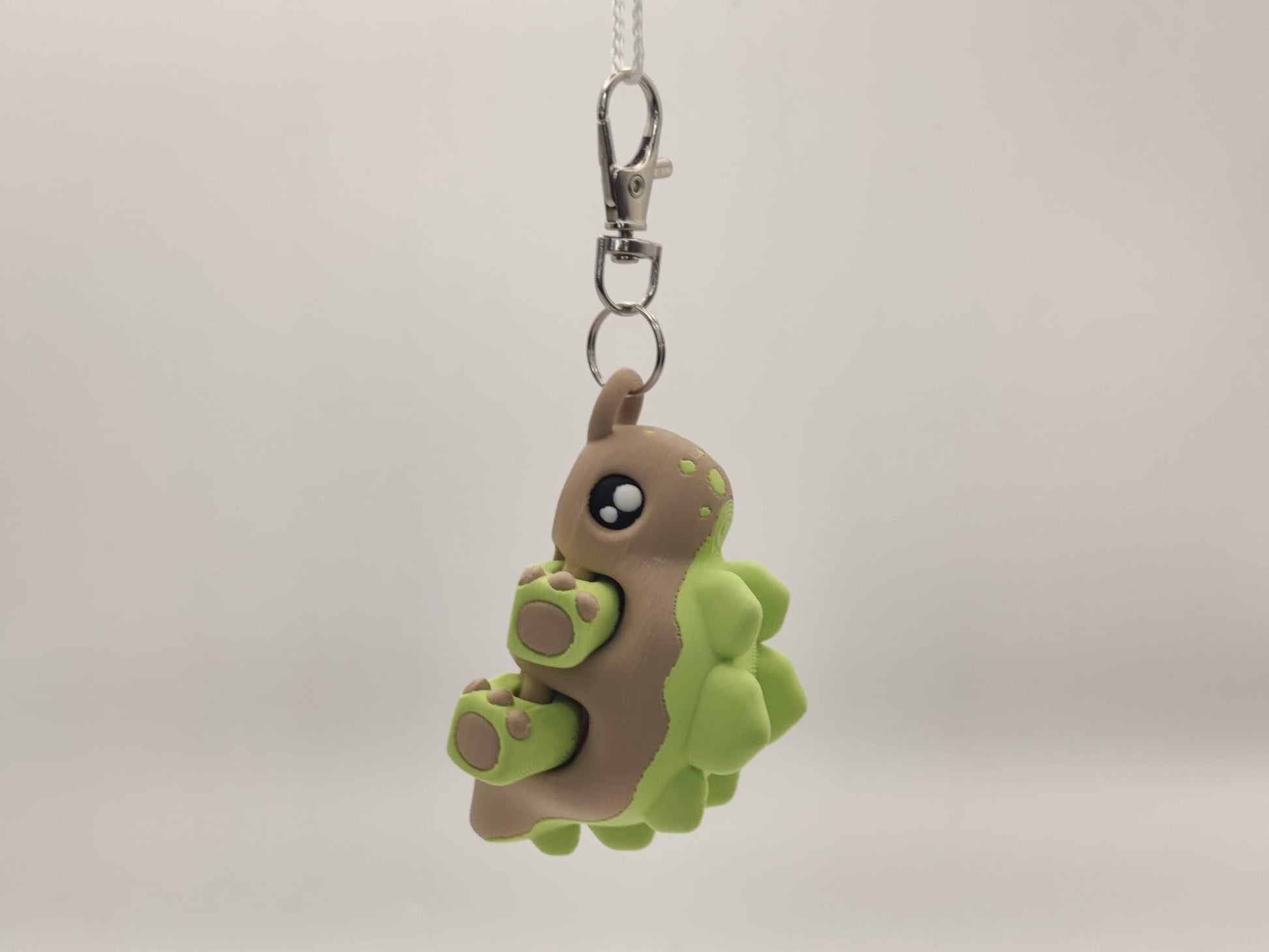 3D Printed Stegosaurus Dinosaur Keychain – Cute Articulated Dino Bag Charm - ToyForge 3D
