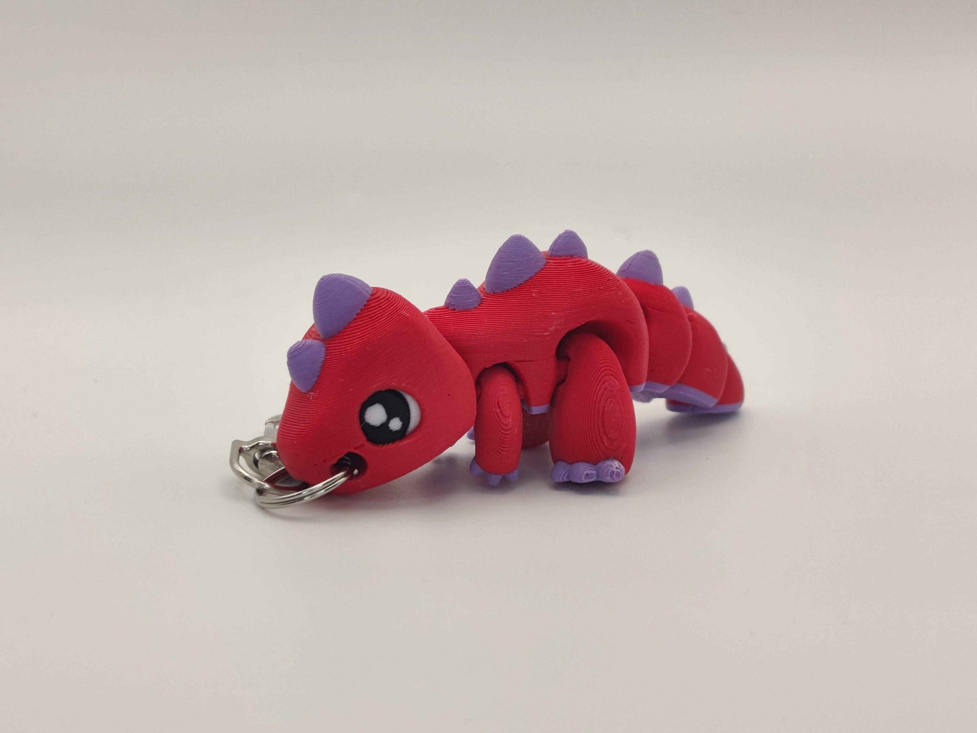 3D Printed T-Rex Dinosaur Keychain – Cute Articulated Dino Bag Charm - ToyForge 3D