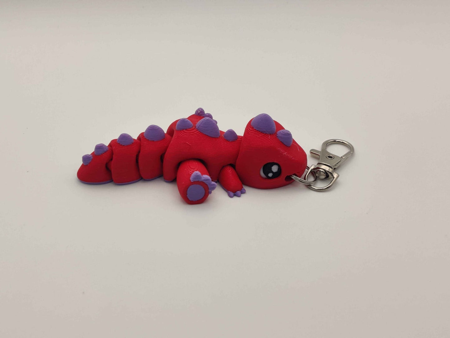 3D Printed T-Rex Dinosaur Keychain – Cute Articulated Dino Bag Charm - ToyForge 3D