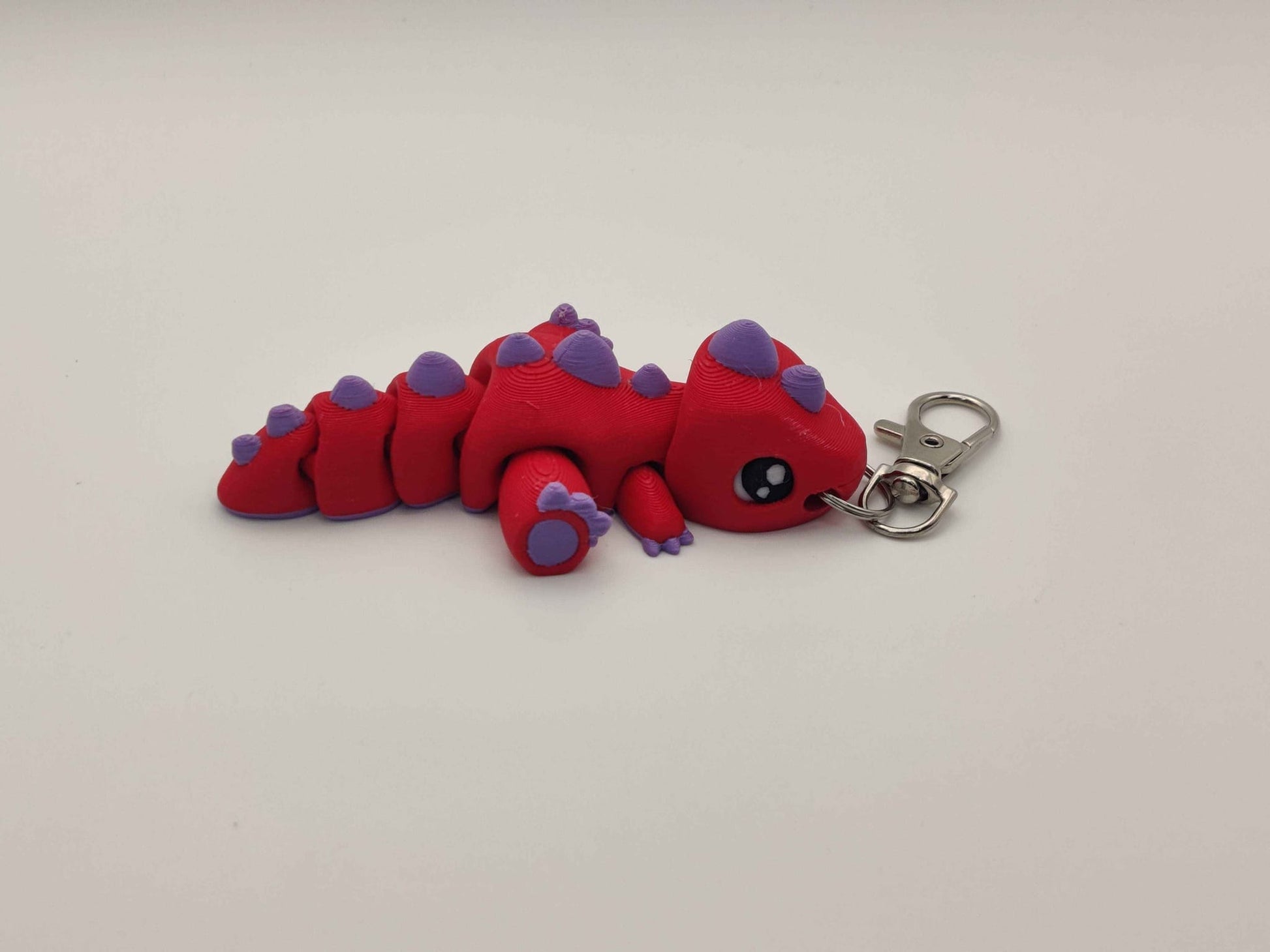 3D Printed T-Rex Dinosaur Keychain – Cute Articulated Dino Bag Charm - ToyForge 3D
