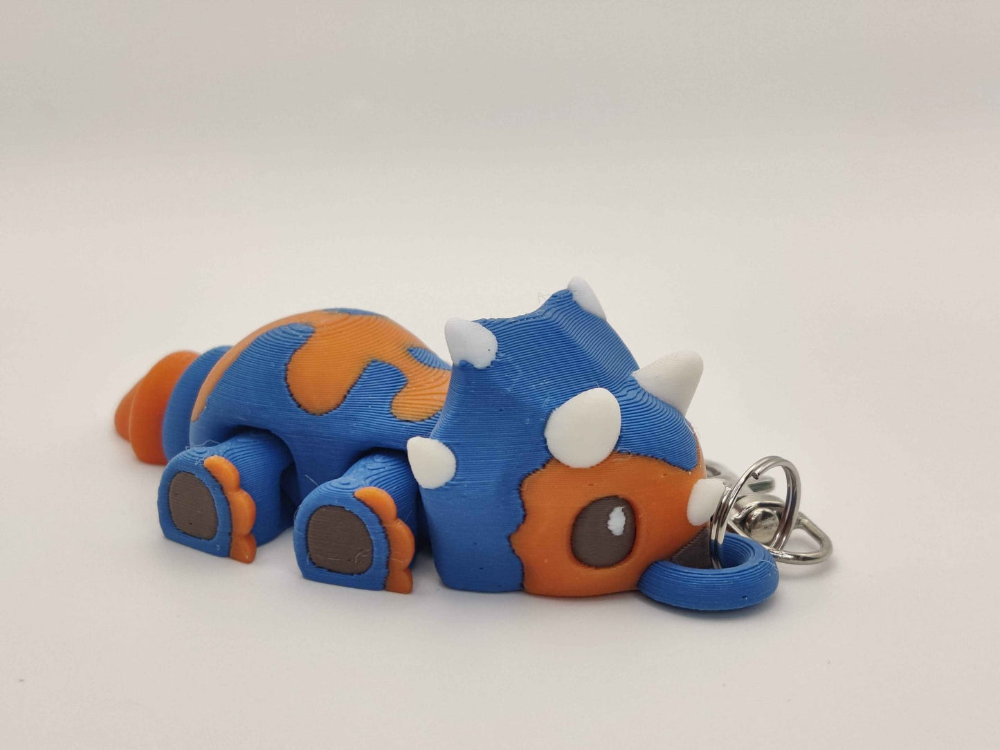 3D Printed Triceratops Dinosaur Keychain – Cute Prehistoric Dino Bag Charm - ToyForge 3D