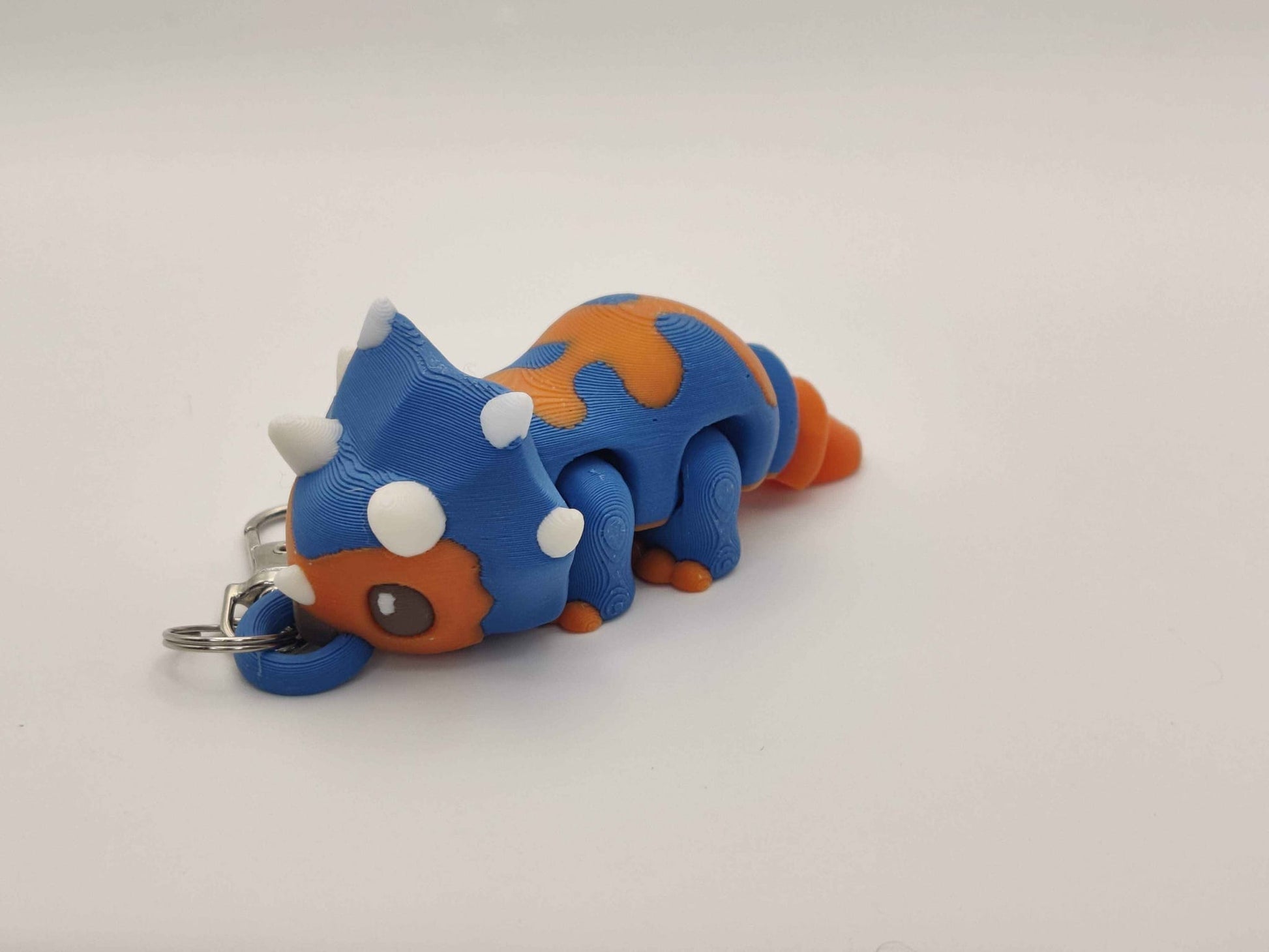3D Printed Triceratops Dinosaur Keychain – Cute Prehistoric Dino Bag Charm - ToyForge 3D