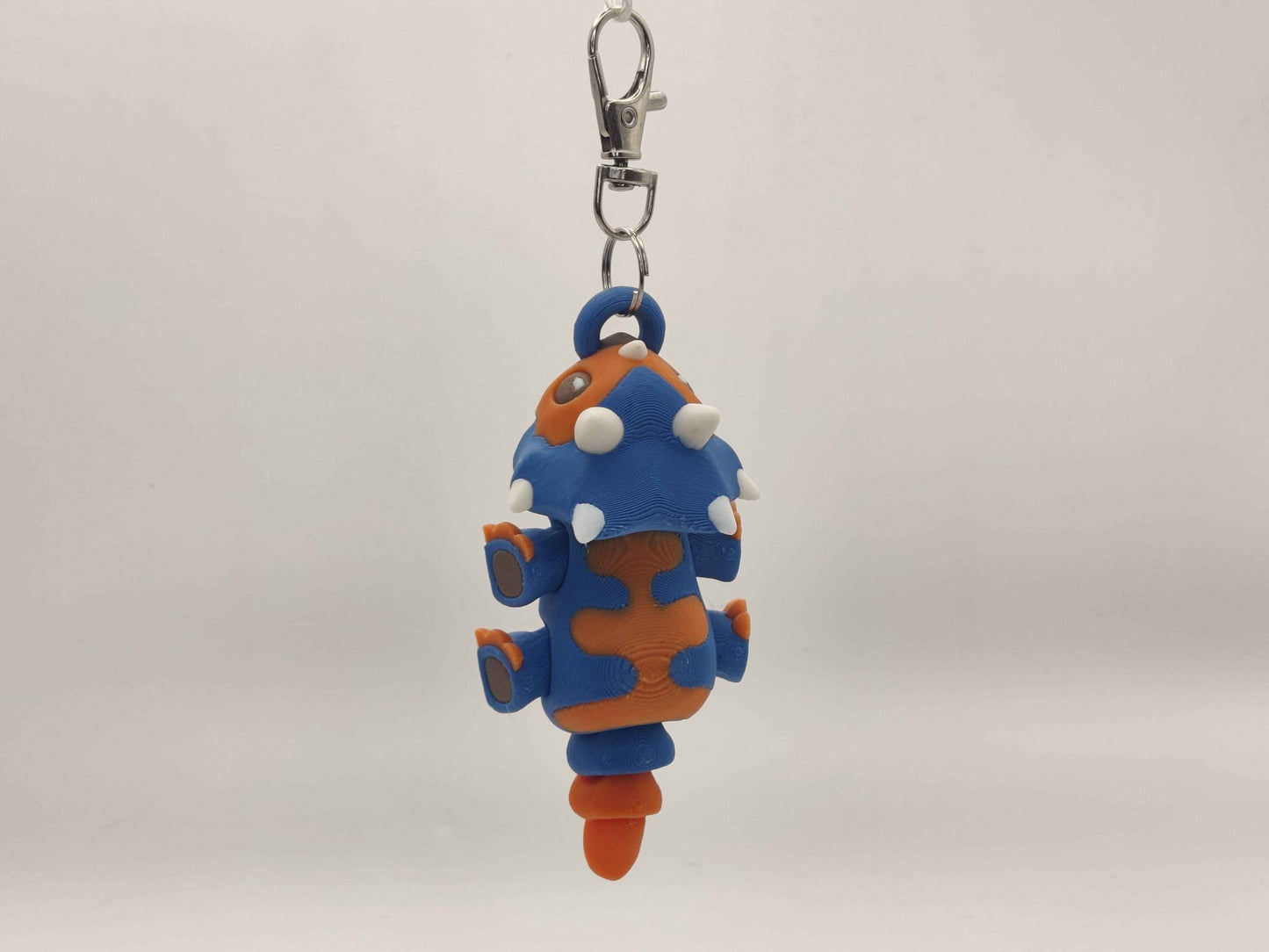 3D Printed Triceratops Dinosaur Keychain – Cute Prehistoric Dino Bag Charm - ToyForge 3D
