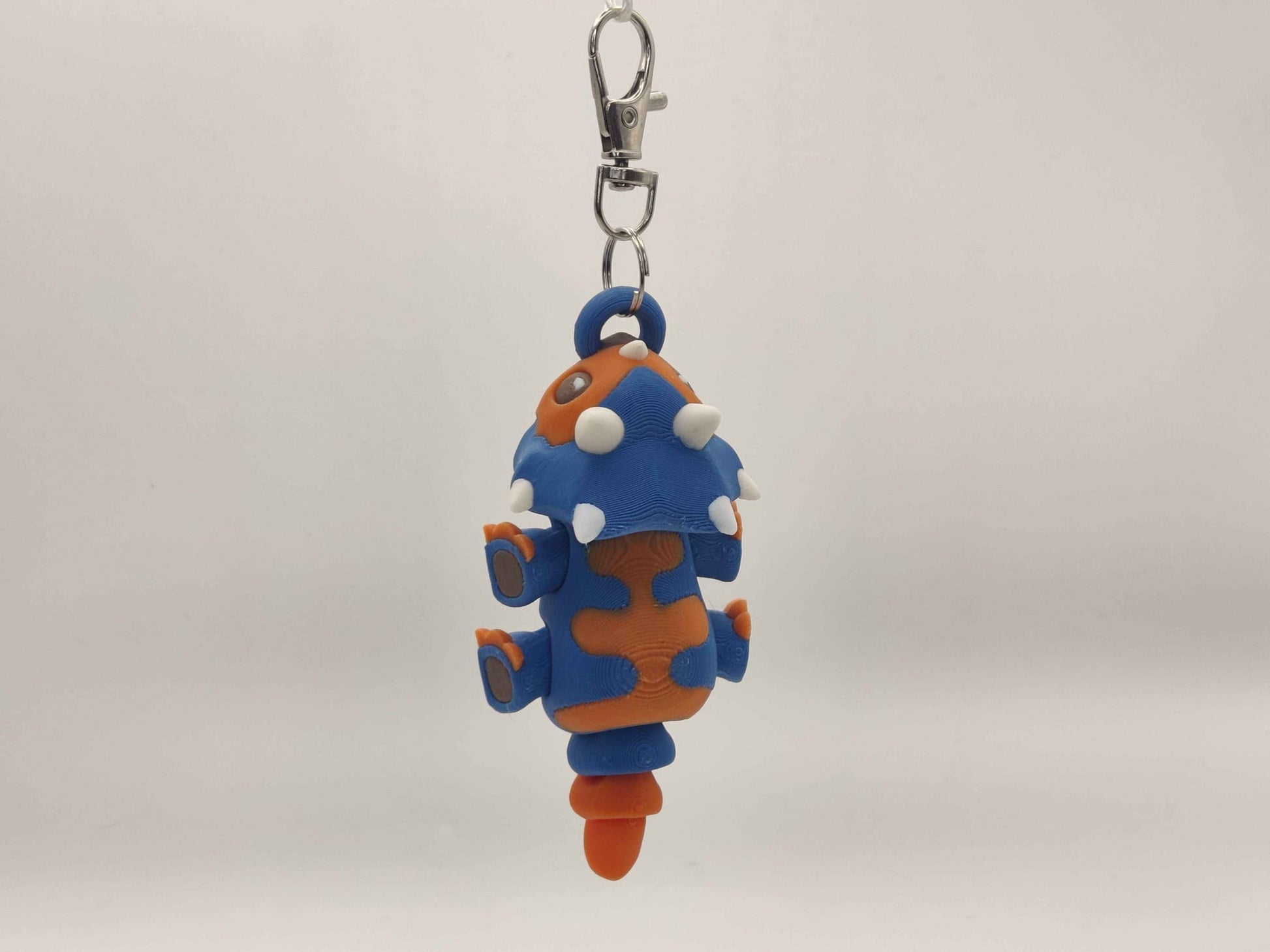 3D Printed Triceratops Dinosaur Keychain – Cute Prehistoric Dino Bag Charm - ToyForge 3D
