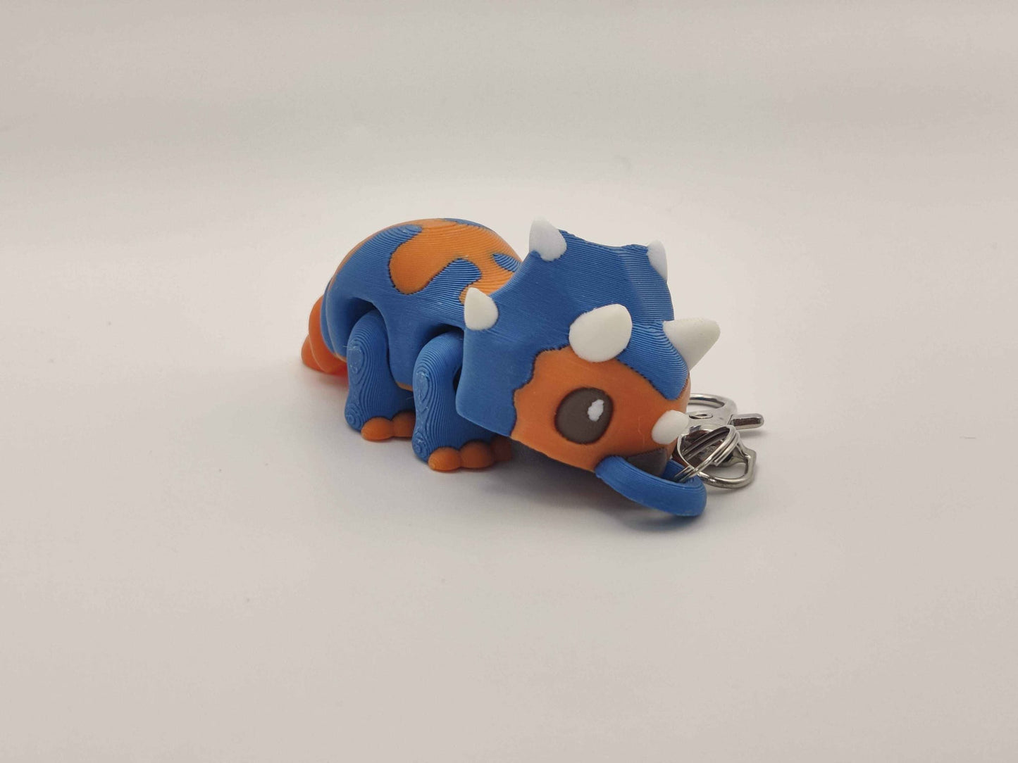 3D Printed Triceratops Dinosaur Keychain – Cute Prehistoric Dino Bag Charm - ToyForge 3D