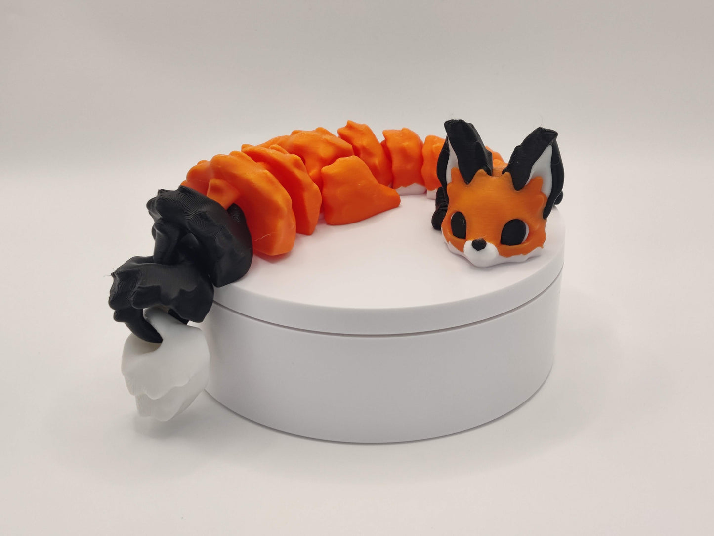 3D Printed Articulated Fox Figure in Orange Black and White