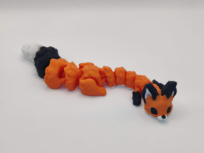 3D Printed Articulated Fox Figure in Orange Black and White