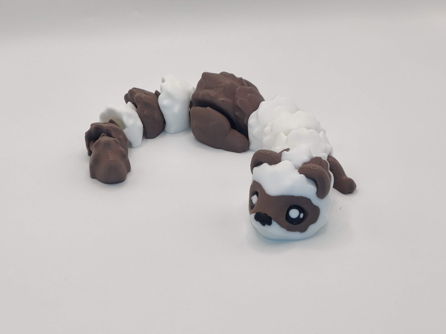 3D Printed Hot Cocoa Ferret Figurine in Brown and White